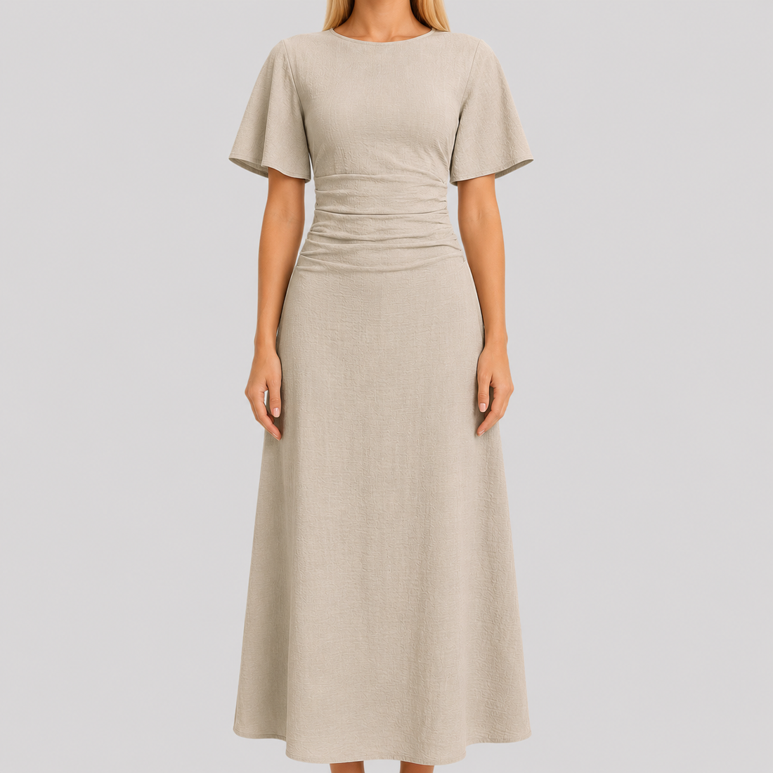 Short sleeve maxi dress with round neckline, ruched waistband, and sleek column silhouette