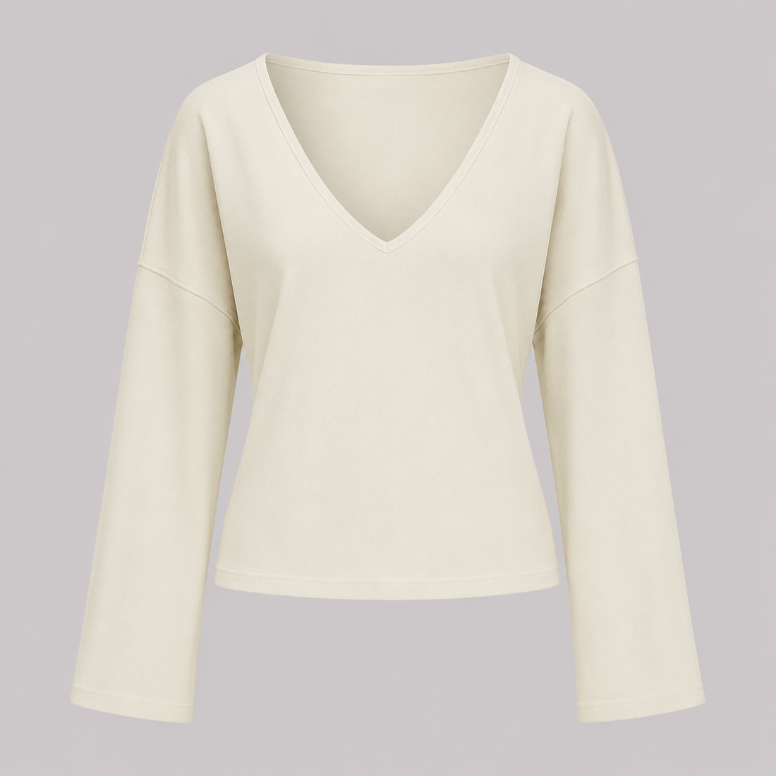 V-neck fitted top with gathered waist, long drape sleeves, and a sleek modern silhouette