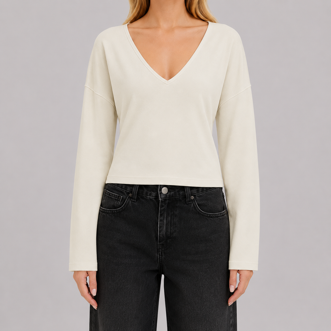 V-neck fitted top with gathered waist, long drape sleeves, and a sleek modern silhouette