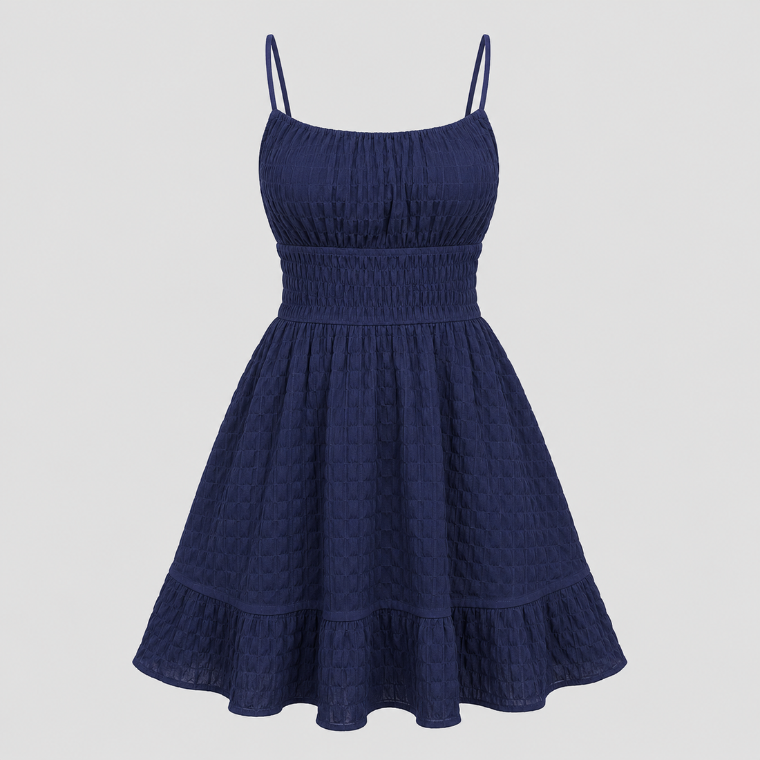 Sleeveless mini sundress with square neckline, smocked waistband, textured fabric, and flared ruffle hem