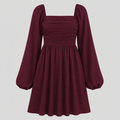 Long sleeve mini dress with square neckline, pleated bodice, defined waist, and flowy fit-and-flare silhouette