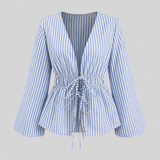 Striped tie-waist blouse with deep V-neck open front, long bell sleeves, and flared hem for a feminine tailored silhouette