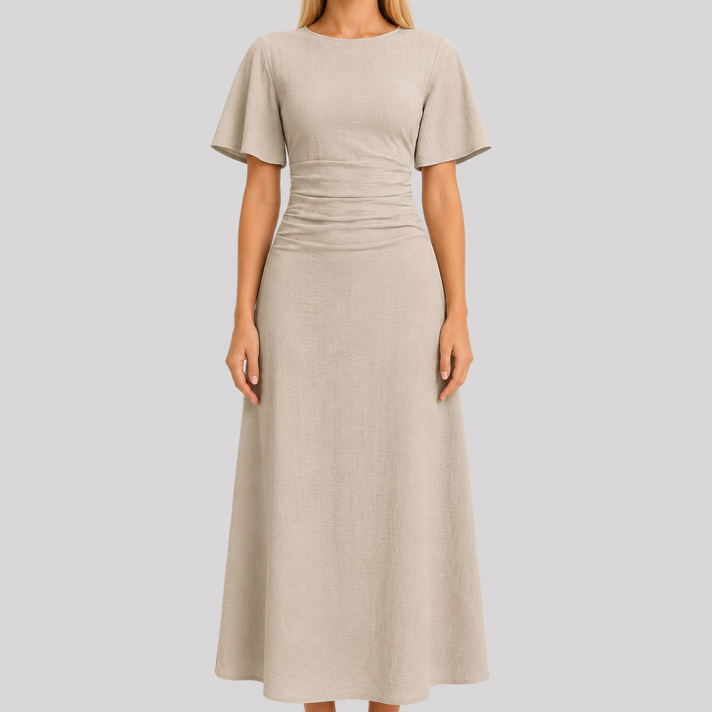 Short sleeve maxi dress with round neckline, ruched waistband, and sleek column silhouette