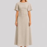 Short sleeve maxi dress with round neckline, ruched waistband, and sleek column silhouette