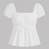 Square-neck peplum top with lace trim, short puff sleeves, adjustable drawstring waist, and flowy hem for a romantic feminine look