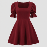 Square-neck mini dress with short puff sleeves, fitted waist, and flared fit-and-flare skirt