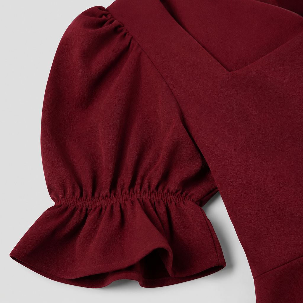 Square-neck mini dress with short puff sleeves, fitted waist, and flared fit-and-flare skirt