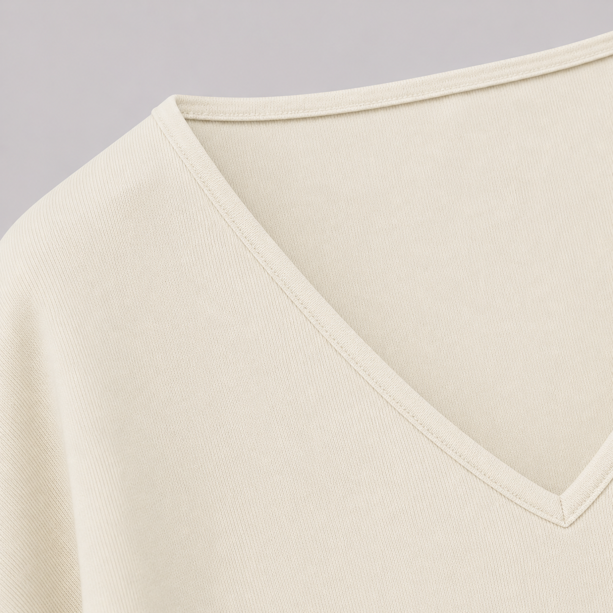 V-neck fitted top with gathered waist, long drape sleeves, and a sleek modern silhouette